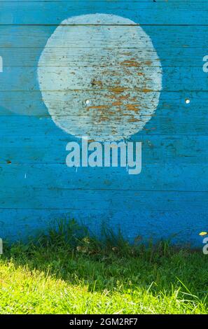 conceptual image of obstacle wall with white target circle drawn on it as business problems concept Stock Photo