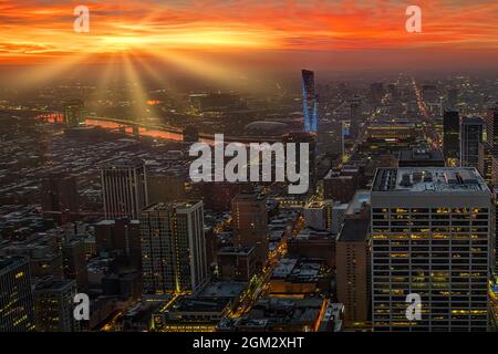 Philadelphia Skyline From Above - View to the Philadelphia skyline during sunset. The warm colors of the sun are reflected on the waters of the Schuyl Stock Photo