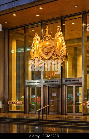 Philadelphia Municipal Services Building - View to the city seal at the entrance of the government office in Philadelphia, Pennsylvania.  This image i Stock Photo