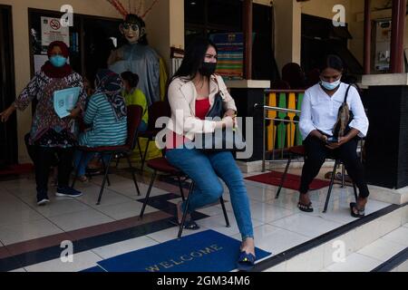Trans Male Wait Their Turn For The Making Of E Ktp Electronic Identity Card In Office<script async src=