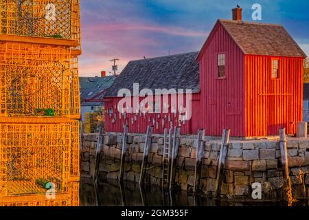 At Motif Number 1  - New England's iconic landmark of Bradley Wharf commonly known as Motif Number One during first light in Rockport, Massachusetts. Stock Photo