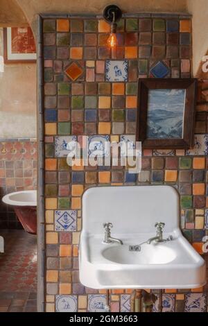 Fonthill Bathroom - View to bathroom the main dormatory in Bucks County iconic landmark of Fonthill Castle in Doylestown, PA.   This image is also ava Stock Photo