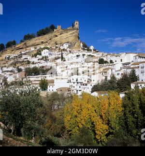 Church on top of crag overlooking the white village in autumn, Montefrio, Andalucia, Spain, Europe Stock Photo