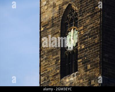 Dial of Magdeburger Dom (Magdeburg Cathedral) with bright sunlight reflections. Stock Photo
