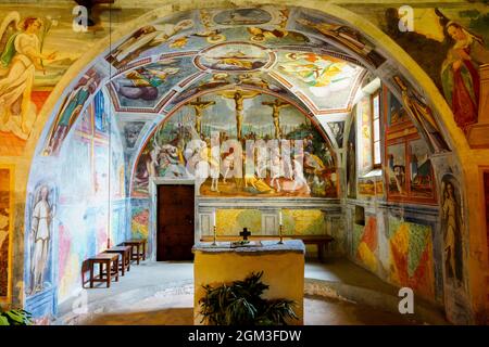 Frescoes in the apse of San Bernardo romanesque church in village of Curzutt, The church is only accessible on foot from Sementina and Monte Carasso o Stock Photo