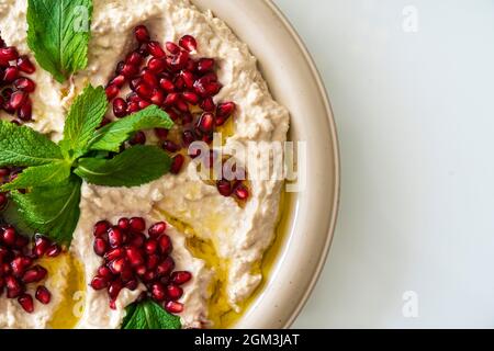 Baba Ghanoush or Baba Ghanoush is a salad dip made of eggplant and liquid flour and an appetizer. Stock Photo