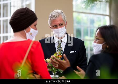 King Philippe - Filip of Belgium meets citizens at a royal reception for eight 'local heroes' nominated by the Be Heroes initiative, at the Royal Cast Stock Photo