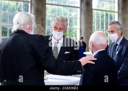 King Philippe - Filip of Belgium meets citizens at a royal reception for eight 'local heroes' nominated by the Be Heroes initiative, at the Royal Cast Stock Photo