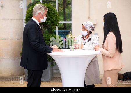 King Philippe - Filip of Belgium meets citizens at a royal reception for eight 'local heroes' nominated by the Be Heroes initiative, at the Royal Cast Stock Photo