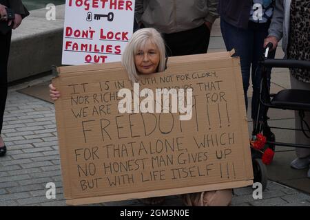 Scottish Parliament, Edinburgh, Scotland, UK, 16th of Sep 2021: Large crowd gather outside the Scottish parliament to protest against the effects of the COVID 19 restrictions, which are restricting people visiting their loved ones, who are in care homes.  Credit:Stable Air Media/ Alamy Live News Stock Photo