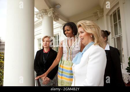 First Lady Michelle Obama hosts First Lady Svetlana Medvedeva of Russia on the Truman Balcony of the White House, June 24, 2010. (Official White House Photo by Lawrence Jackson) This official White House photograph is being made available only for publication by news organizations and/or for personal use printing by the subject(s) of the photograph. The photograph may not be manipulated in any way and may not be used in commercial or political materials, advertisements, emails, products, promotions that in any way suggests approval or endorsement of the President, the First Family, or the Whit Stock Photo