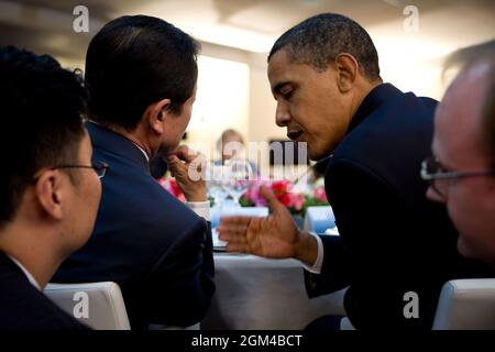 President Barack Obama confers with Prime Minister Taro Aso at the G-8 summit in L'Aquila, Italy, July 8, 2009. Official White House Photo by Pete Souza This official White House photograph is being made available for publication by news organizations and/or for personal use printing by the subject(s) of the photograph. The photograph may not be manipulated in any way or used in materials, advertisements, products, or promotions that in any way suggest approval or endorsement of the President, the First Family, or the White House. Stock Photo