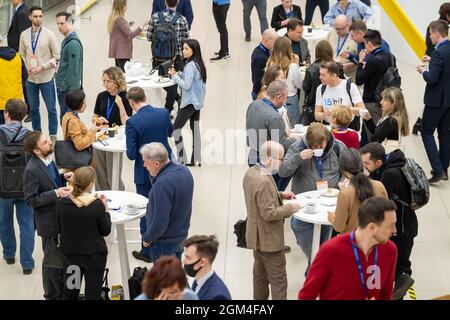 Group of people having coffee break during conference Stock Photo