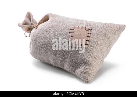 bag coarse fabric with botch on white background with soft shadow Stock Photo