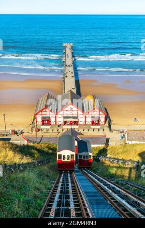 Victorian fishing pier at Saltburn by the Sea, North Yorkshire, the only remaining pleasure pier on the north east coast of England, Stock Photo