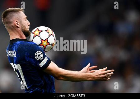 Milan, Italy. 15 September 2021. Milan Skriniar of FC Internazionale controls the ball during the UEFA Champions League football match between FC Internazionale and Real Madrid CF. Credit: Nicolò Campo/Alamy Live News Stock Photo