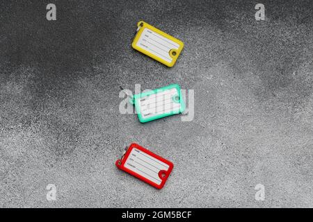 Different key tags on grunge background Stock Photo