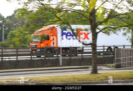 TNT truck on motorway. TNT Express is an international courier delivery ...