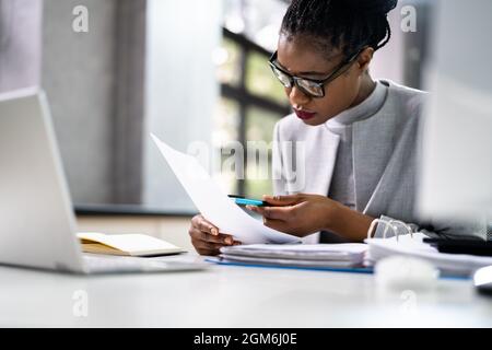 Tax Account Working With Public Records Ledger Stock Photo