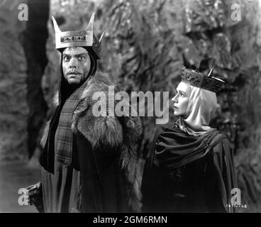 ORSON WELLES and JEANETTE NOLAN as Lady Macbeth in MACBETH 1948 director / producer ORSON WELLES play William Shakespeare adaptation Orson Welles music Jacques Ibert costume design (men) Fred A. Ritter and (women) Adele Palmer executive producer Charles K. Feldman Mercury Productions / Republic Pictures Stock Photo