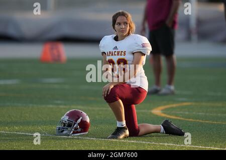 Arcadia Apaches kicker Victoria Kenworthy (28) stretches during a high school football game against La Salle Spartans, Thursday, Sept. 16, 2021, in Pa Stock Photo
