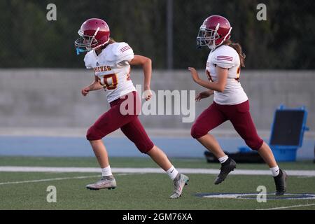 Arcadia Apaches punter Kayla Ibrahim (20) and kicker Victoria Kenworthy (28) during a high school football game against La Salle Spartans, Thursday, S Stock Photo