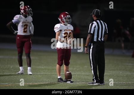Arcadia Apaches kicker Victoria Kenworthy (28) talks with a referee during a high school football game against La Salle Spartans, Thursday, Sept. 16, Stock Photo