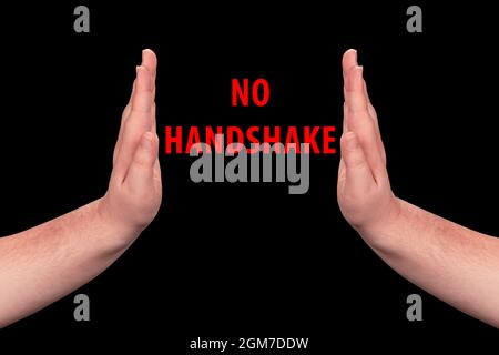 no handshake concept or two man hands giving high five isolated. copy space. black background. Stock Photo