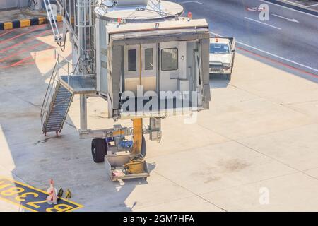 airplane Bridge in airport for passengers boarding or Jetway waiting for a plane to arrive on airport or airport terminal boarding gate. Stock Photo