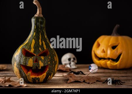 Halloween green pumpkins on rustic wooden table Stock Photo