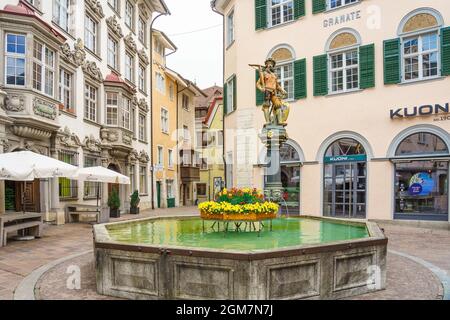 SCHAFFHAUSEN, SWITZERLAND - APRIL 15, 2018: Statue of a swiss guard situated on the top of a fountain on the Fronwagplatz square in the swiss city Sch Stock Photo