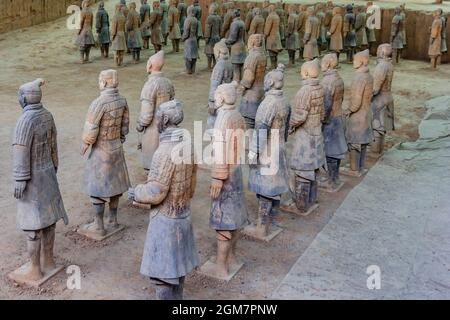 The Terracotta Army or the 'Terra Cotta Warriors and Horses' buried in the pits next to the Qin Shi Huang's tomb in 210-209 BC in Xian of Shaanxi Prov Stock Photo