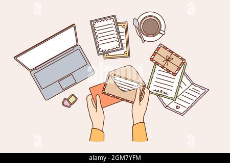 Workplace space and table concept. Top view of human hands sending postcard in envelope on working table vector illustration  Stock Vector