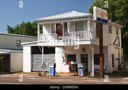 Small Town Exxon Gas Station Sign Showing Low Gas Prices Ca 1995 Stock Photo Alamy