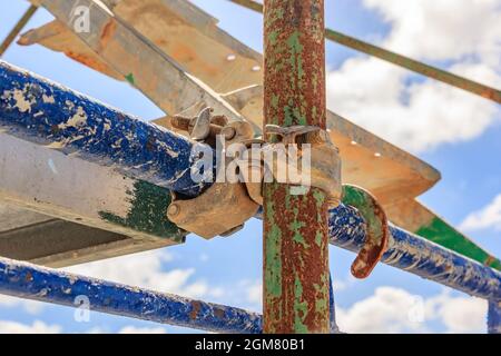 Scaffolding pipe clamp and parts, An important part of building strength to scaffold. Stock Photo