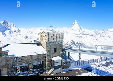 ZERMATT, SWITZERLAND - APRIL 13, 2018: The observatory on Gornergrat Summit overlooking Matterhorn as background in Zermatt, an iconic emblem of the S Stock Photo