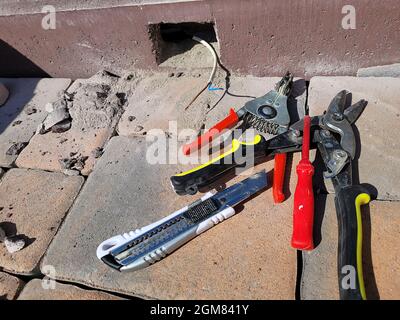 installation of the lamp in a concrete curb. Selective focus Stock Photo
