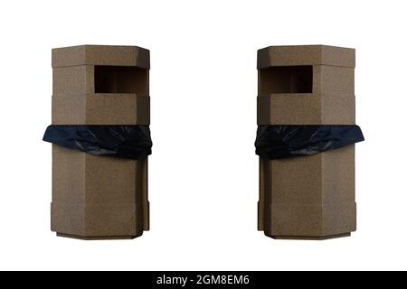 Brown plastic recycle bin and black bag isolated on white background Stock Photo