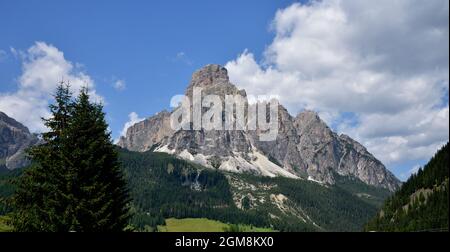 Mount Sassongher, 2665 meters high, one of the most characteristic near the town of Corvara in Badia Stock Photo