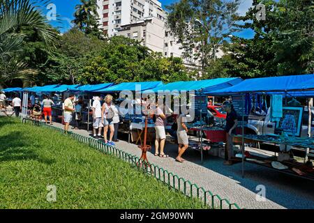 RIO DE JANEIRO, BRAZIL - MAY 4, 2014: People at the antique fair in the neighborhood of Gavea Stock Photo