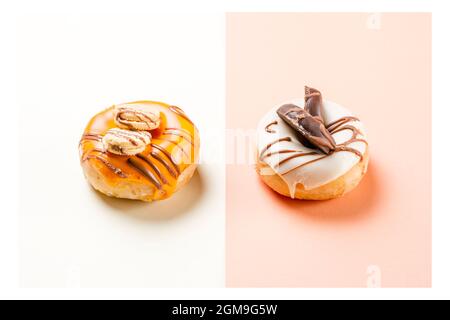 Photograph of two donuts decorated with cookies and drawn with chocolate.The photo is taken in landscape format and has a white frame around it. Stock Photo