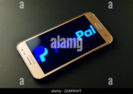 Italy - february 10, 2019: paypal logo on mobile phone, paypal mobile aaplication Stock Photo