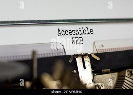 Accessibility and accessible WEB symbol. Concept words 'Accessible WEB' typed on old retro typewriter. Diversity, inclusion, belonging and accessible Stock Photo