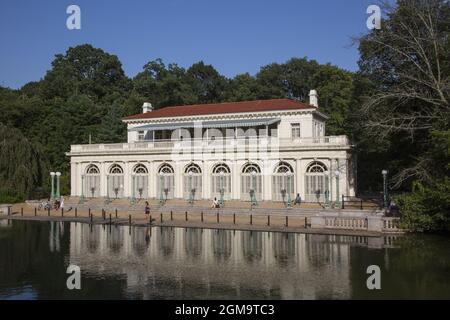 The classic Boat House (built 1905) in Prospect Park viewed from the Lullwater Bridge. Stock Photo