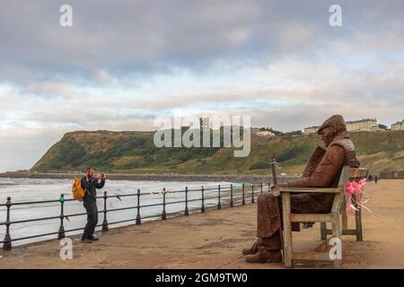 Freddie Gilroy and the Belsen Stragglers much loved statue by sculptor Ray Lonsdale which overlooks North Bay of Scarborough, England. Stock Photo