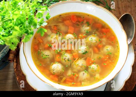 vegetable soup on wooden background Stock Photo