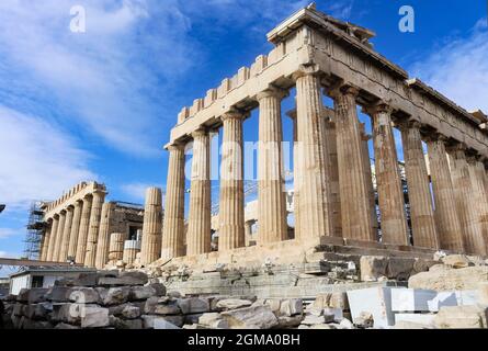 Closeup of Parthenon on Acropolis angled against very blue sky showing ongoing reconstruction work on far side - Athens Greece 1-3-2018 Stock Photo