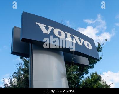 Volvo car logo and sign outside car dealer showroom, Exeter Stock Photo