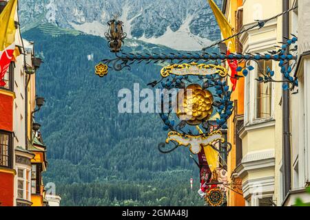 Commercial signs in the historic center of Innsbruck on Herzog-Friedrich-Strasse. Innsbruck, Tyrol, Austria, Europe Stock Photo