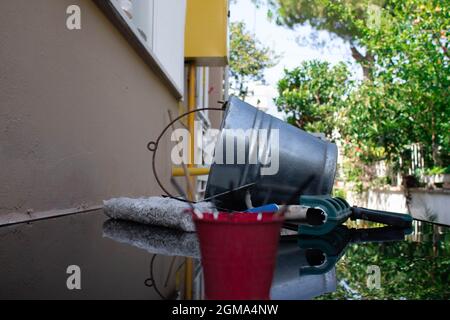 tools and screws in different buckets. everybody have different abilities some are better some are worse. Stock Photo